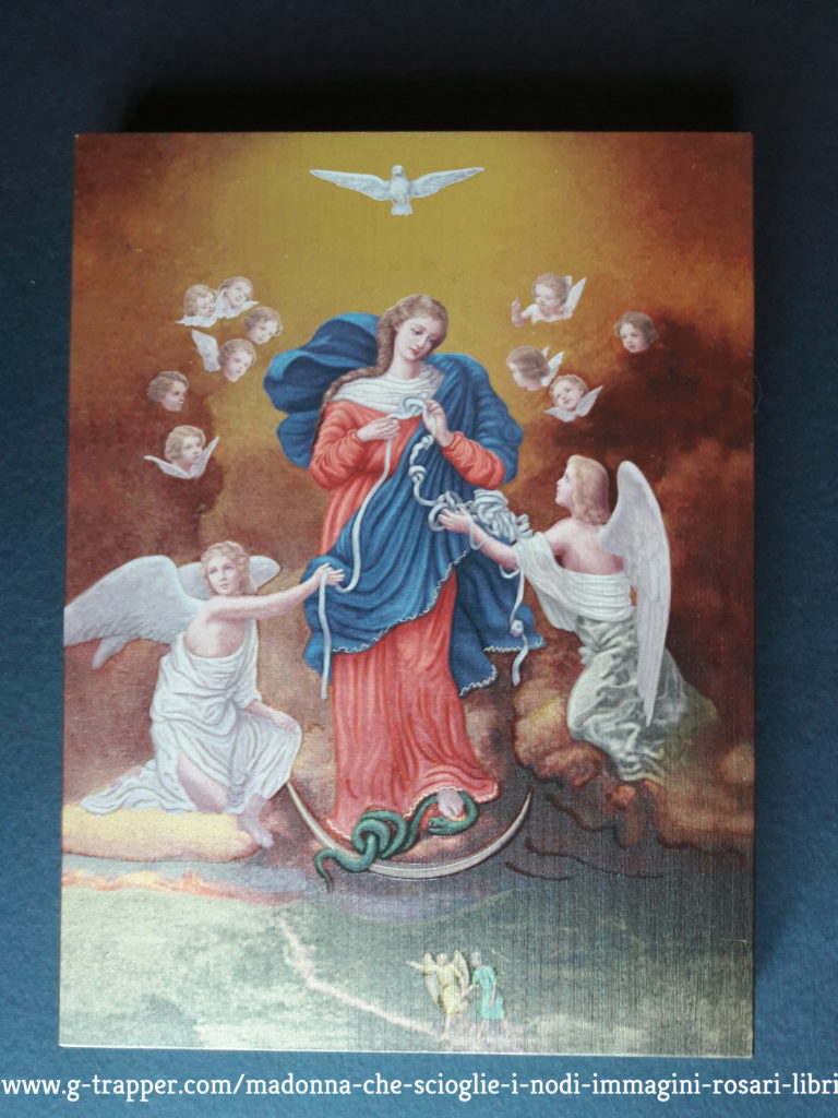 Tavola tipo icona della Madonna che scioglie i nodi misura indicativa cm 20x30 fornita in scatola da regalo. Finiture accurate. Leggero rilievo. http://www.g-trapper.com/madonna-che-scioglie-i-nodi-immagini-rosari-libri  Per il calendario dei pellegrinaggi dalla Madonna che scioglie i nodi vedi questo link  www.g-trapper.com/calendario-pellegrinaggi-promossi-da-g-trapper 